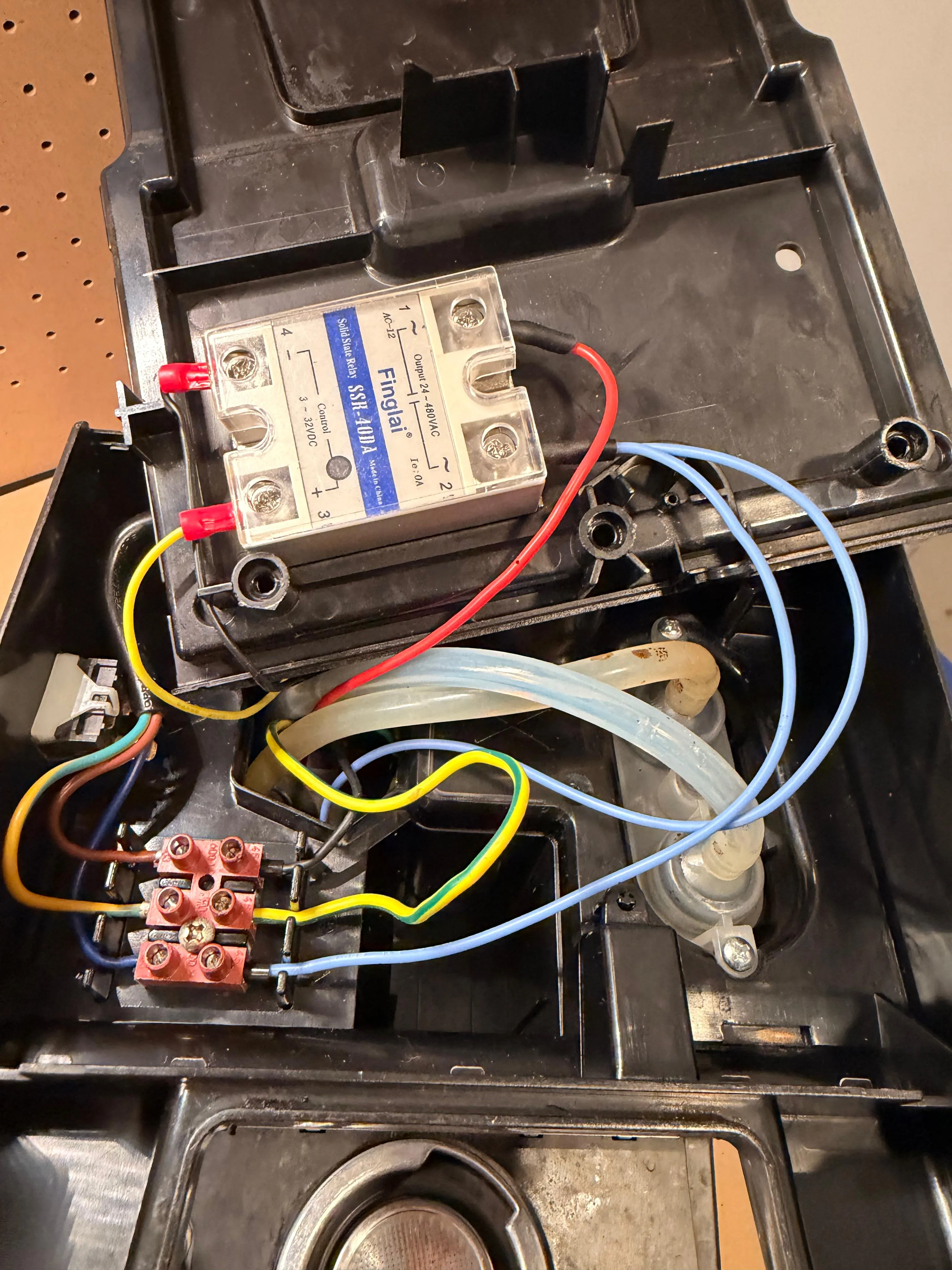 The SSR will be mounted at the base of the machine, near the plug.