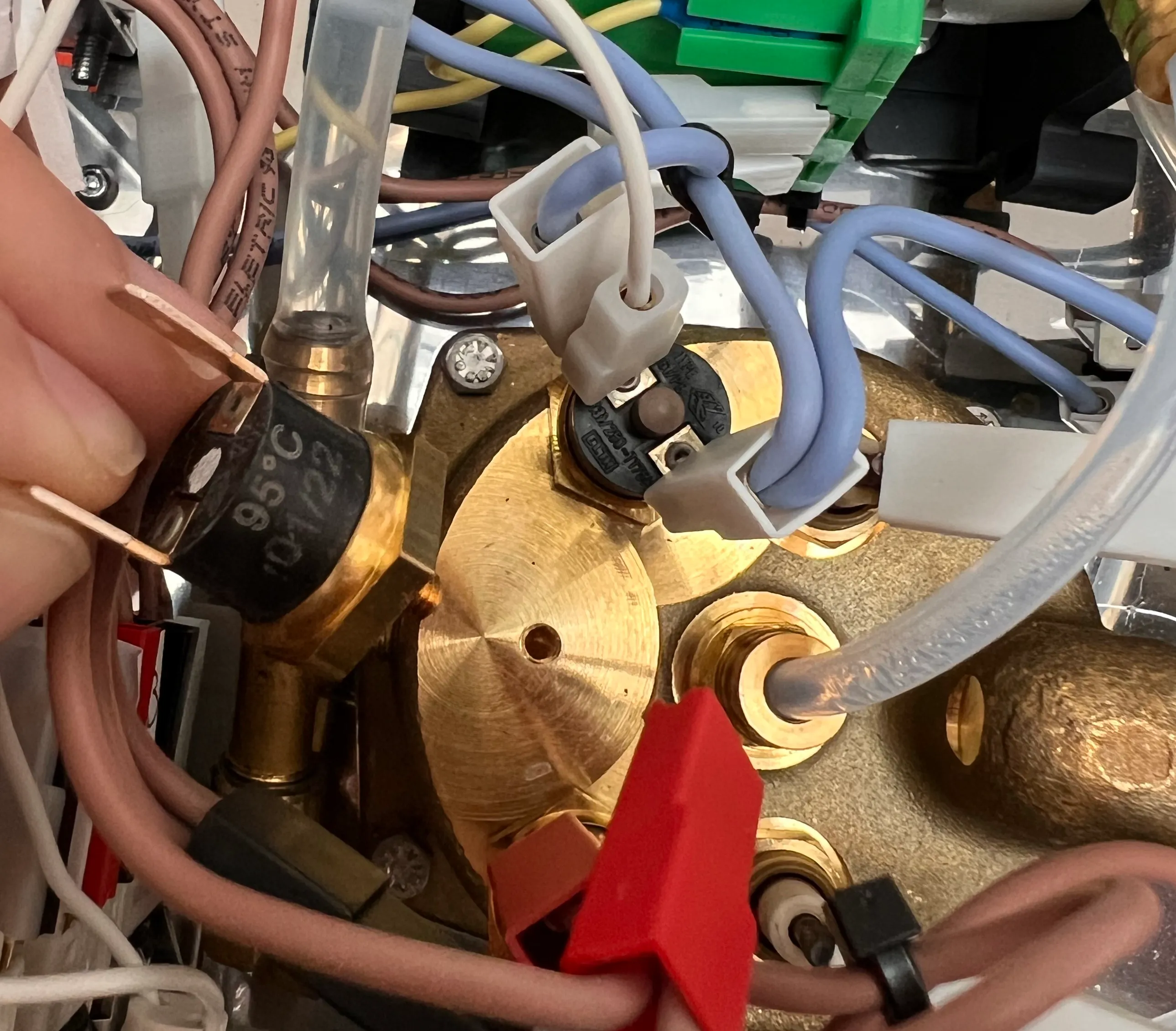 95°C coffee thermostat (component 4) unscrewed from its boiler hole, leaving the threaded location empty for the M4 thermocouple